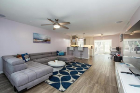 Cheerful 2-bedroom, 2 bathrooms vacation home with salt heated pool.